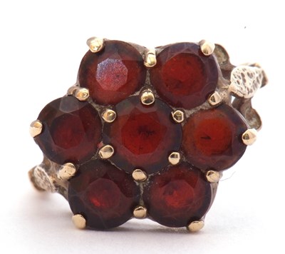 Lot 24 - 9ct gold and garnet cluster ring, a flowerhead...