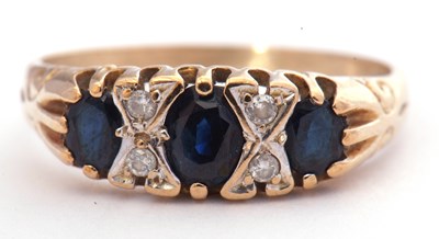 Lot 35 - 9ct gold sapphire and diamond seven stone ring...