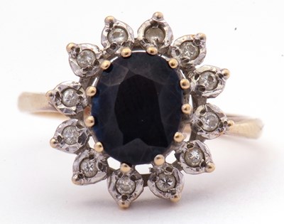 Lot 43 - 9ct gold sapphire and diamond cluster ring,...