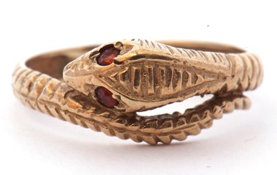 Lot 48 - 9ct gold serpent ring, the head highlighted...