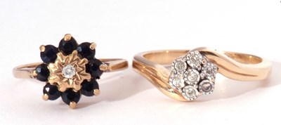 Lot 59 - A 9ct gold sapphire and diamond cluster ring,...
