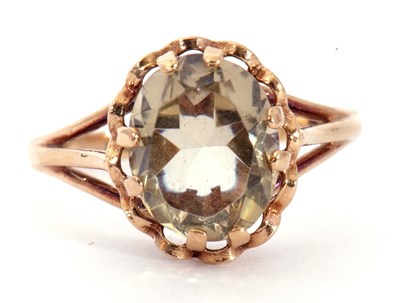 Lot 64 - 9ct gold lemon quartz set ring, the oval...
