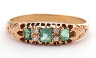 Lot 66 - Green stone and small diamond ring featuring...