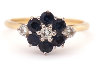 Lot 67 - 18ct gold sapphire and diamond cluster ring,...