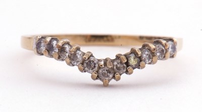 Lot 84 - 9ct gold and diamond wishbone design ring...