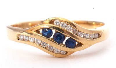 Lot 88 - Sapphire and diamond cross-over style ring,...