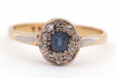 Lot 31 - Sapphire and diamond cluster ring, the cushion...