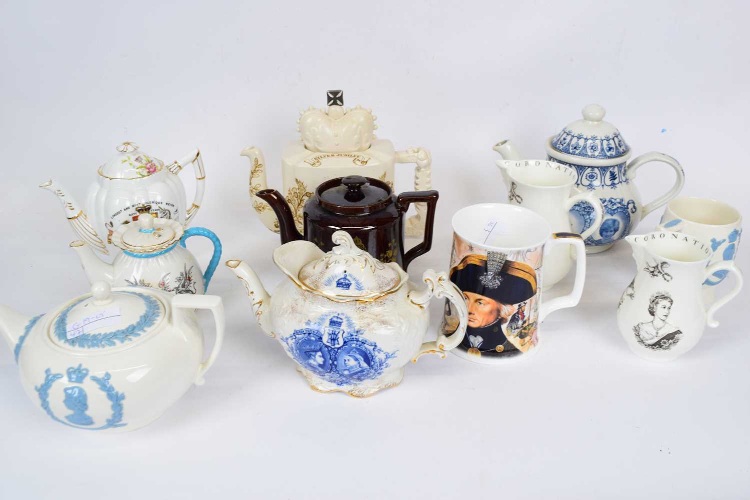Lot 79 - Group of commemorative tea pots for Queen...