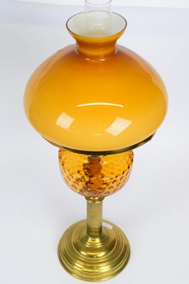 Lot 84 - Victorian oil lamp with amber coloured...