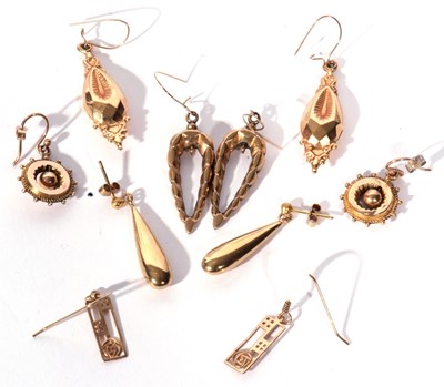 Lot 139 - Five pairs of yellow metal earrings, one pair...