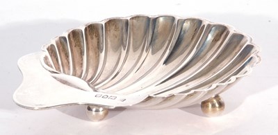 Lot 10 - Edwardian butter shell of typical form,...