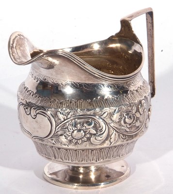 Lot 16 - George III large baluster cream jug with...