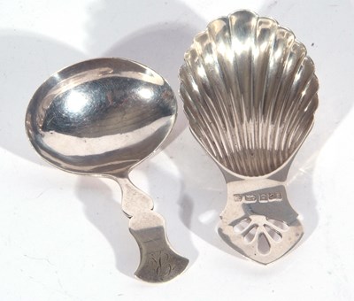 Lot 99 - George III caddy spoon with shaped hourglass...