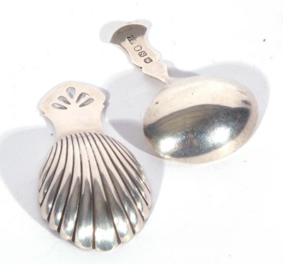 Lot 99 - George III caddy spoon with shaped hourglass...