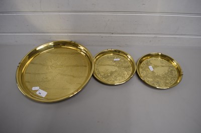 Lot 54 - TWO BRASS WARE DISHES AND A LARGER DISH, ALL...