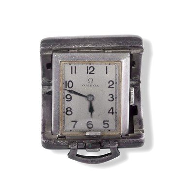 Lot 418 - Small silver folding Omega travel clock with...