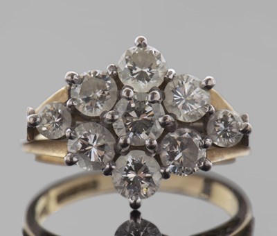 Lot 323 - 18ct gold diamond cluster ring, a flowerhead...