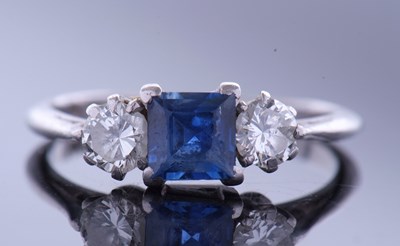 Lot 330 - Sapphire and diamond three stone ring,...