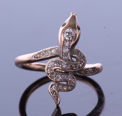 Lot 334 - Vintage diamond set serpent ring, the coiled...