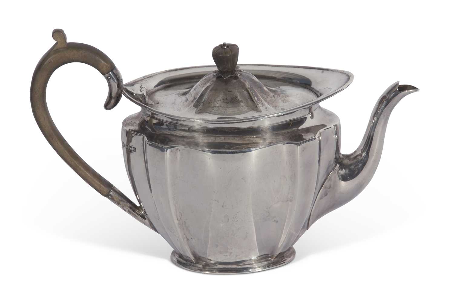 Lot 268 - George V teapot of fluted oval tapering form...