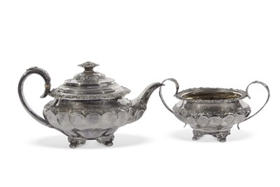 Lot 274 - George IV teapot of ribbon fluted compressed...