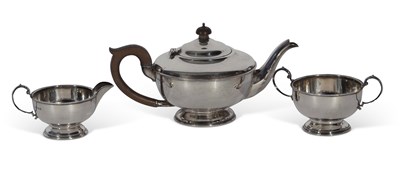 Lot 284 - George V three-piece tea set of circular form...