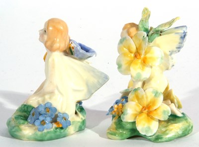 Lot 27 - Two Royal Doulton figures of fairies one...