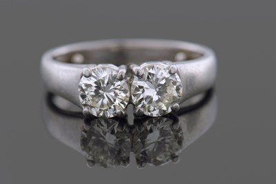 Lot 467 - A Two Stone Diamond Ring featuring two round...