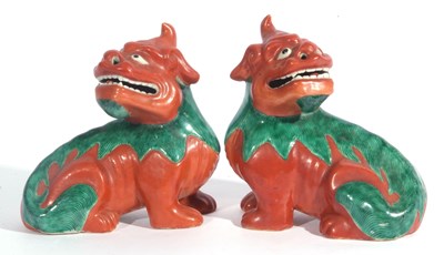 Lot 152 - Pair of Oriental Shi-Shi lions with a brown...