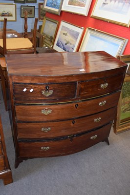 Lot 308 - Late Georgian mahogany bow front chest of two...