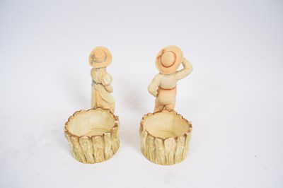 Lot 147 - Pair of Royal Worcester figures of a boy and a...