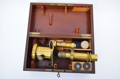 Lot 242 - 19th century lacquered brass microscope with...