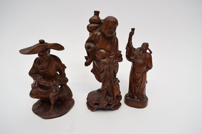 Lot 15 - Group of three Chinese carved wooden figures...