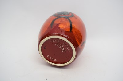 Lot 53 - Poole Pottery vase, the red ground with grey...
