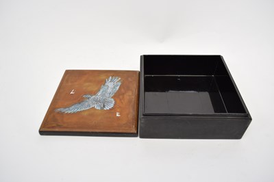 Lot 76 - Lacquer box, the cover with a model of an...