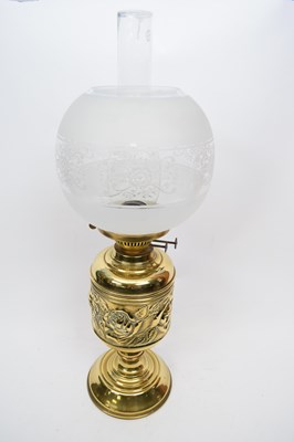 Lot 114 - Brass lamp with floral design to shade