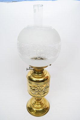 Lot 114 - Brass lamp with floral design to shade