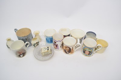 Lot 135 - Quantity of commemorative mugs and tin...