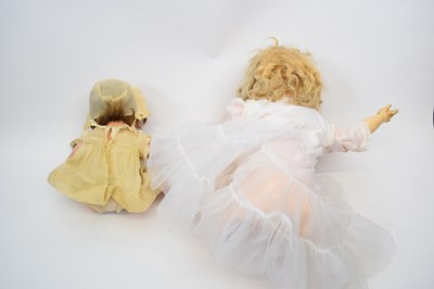 Lot 137 - Two early 20th century dolls with bisque heads,...