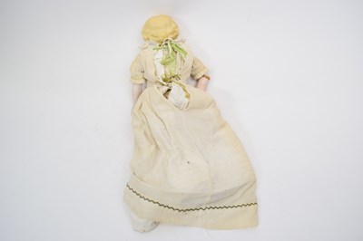 Lot 138 - Doll with ceramic head