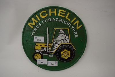 Lot 47 - Circular cast iron wall plaque 'Michelin Tyres...