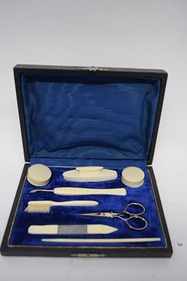 Lot 235 - Boxed needlework set with bone handles