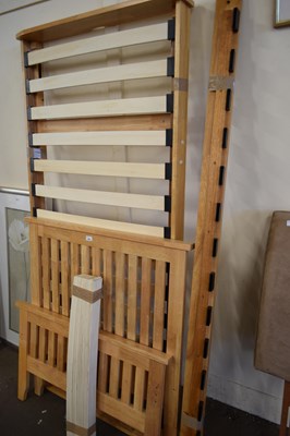 Lot 688 - MODERN SINGLE BED WITH SLATTED BASE AND PULL...