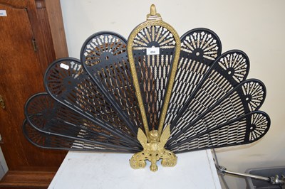 Lot 694 - METAL PEACOCK SPARK GUARD AND A VINTAGE CAT...