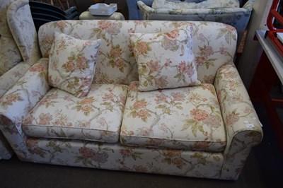 Lot 769 - FLORAL UPHOLSTERED TWO SEATER SOFA