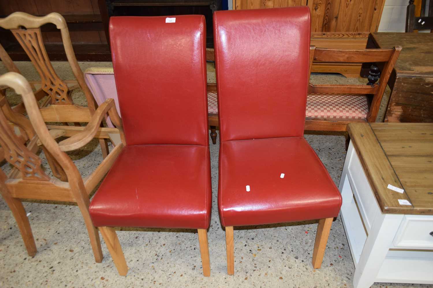 Lot 142 - PAIR OF MODERN RED LEATHER UPHOLSTERED DINING...