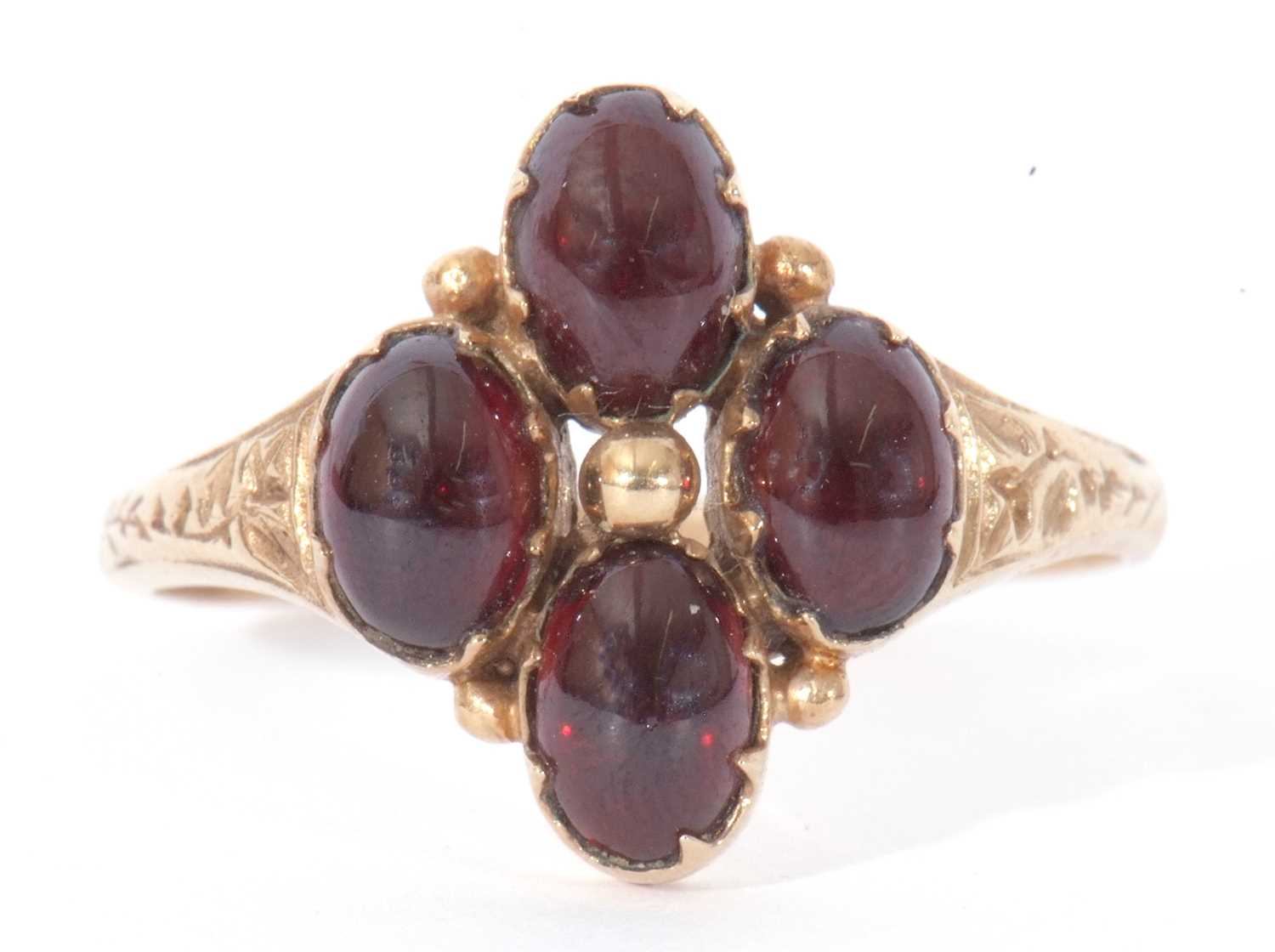 Lot 11 - 9ct gold and garnet set ring, the gold bead...
