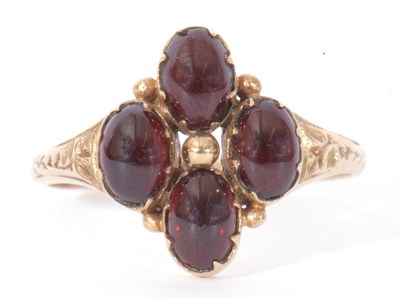Lot 11 - 9ct gold and garnet set ring, the gold bead...