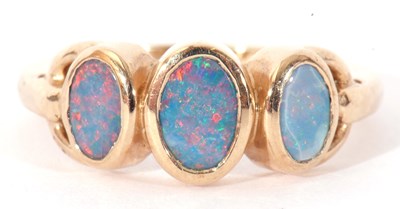 Lot 18 - Modern 9ct gold and opalescent three stone...