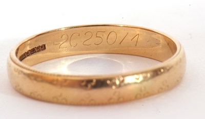 Lot 19 - 18ct gold wedding ring of plain polished...